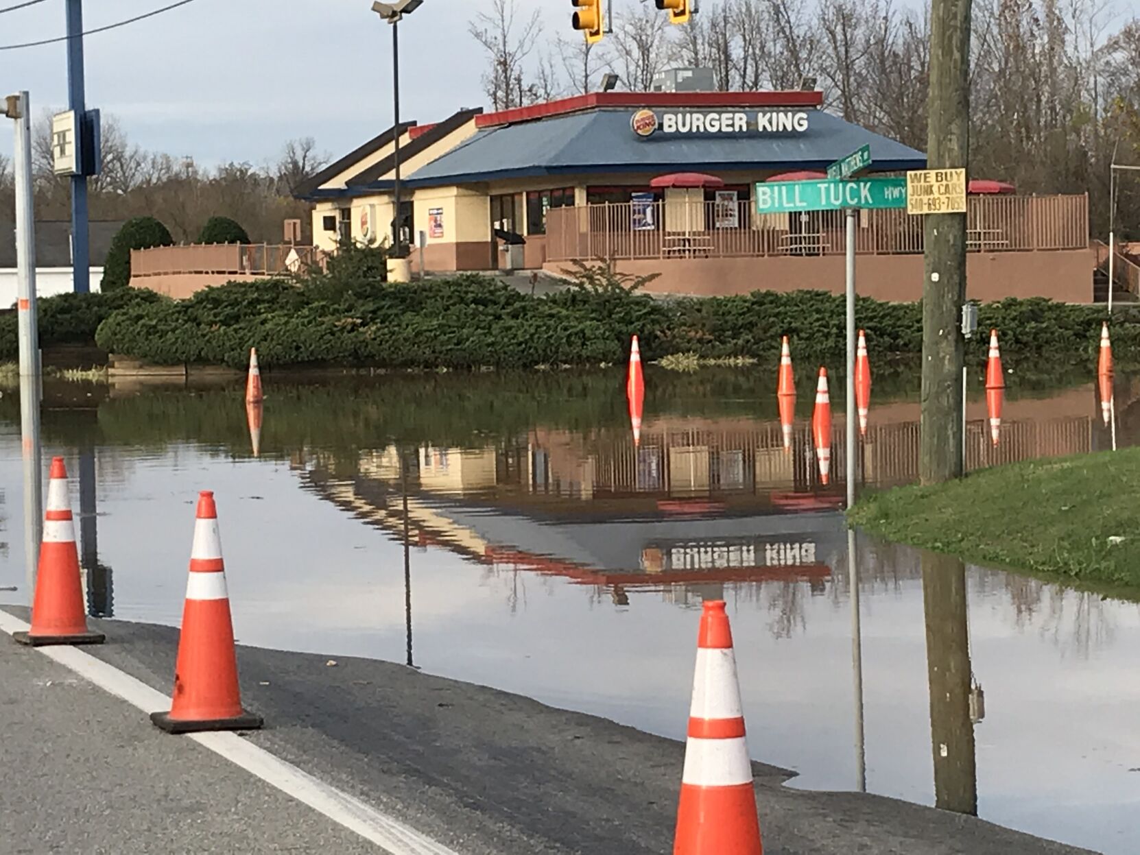 Floodwater pass the Burger King entrance on 58.jpg